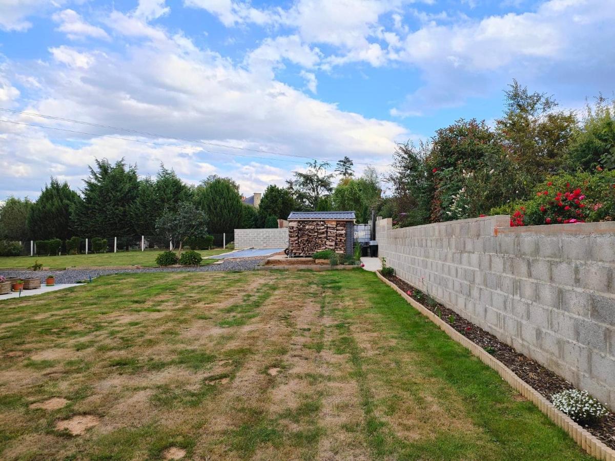 Maison confortable lumineuse avec jardin à 5 mn Bayeux au calme Guéron Esterno foto